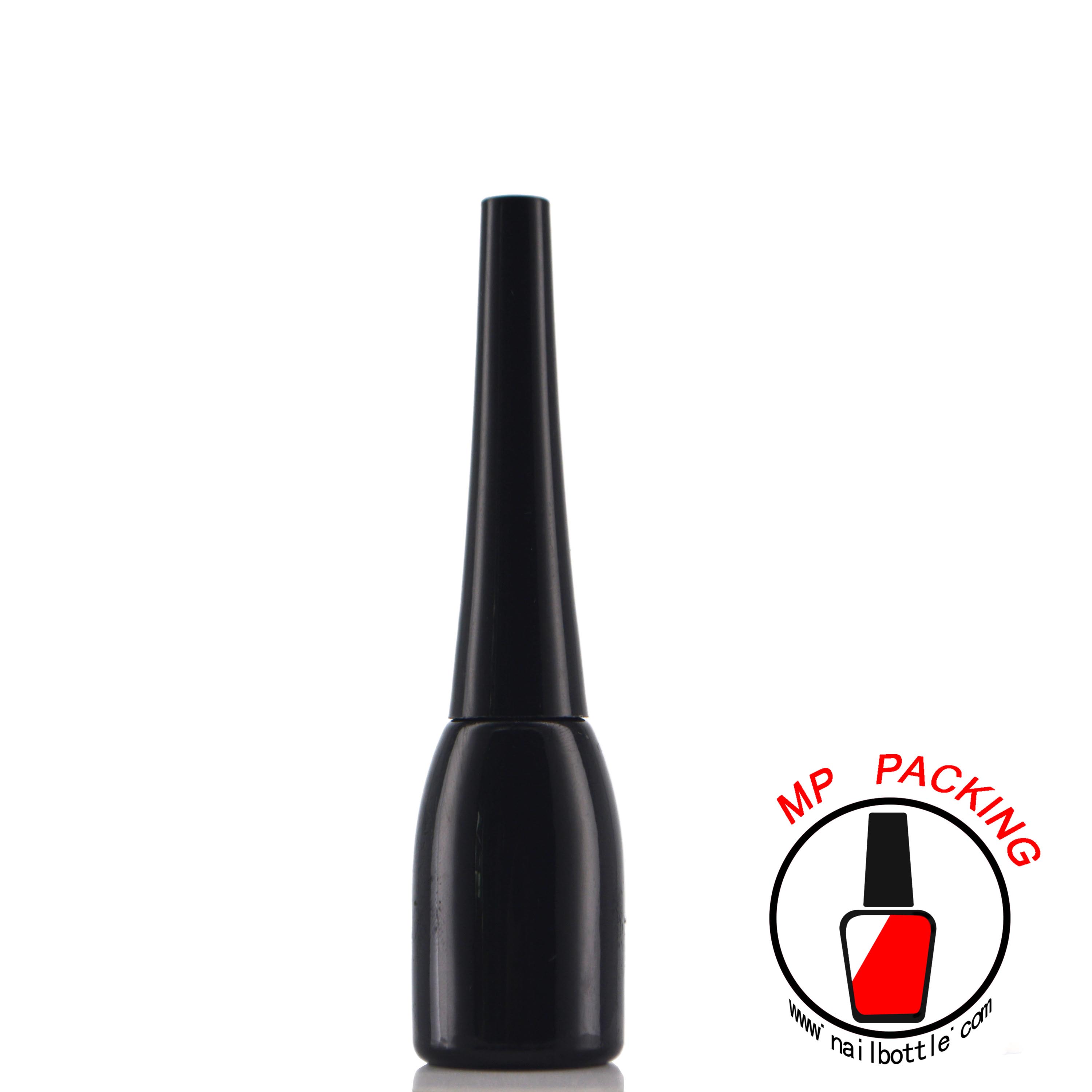 empty black bottle with lids and brush 