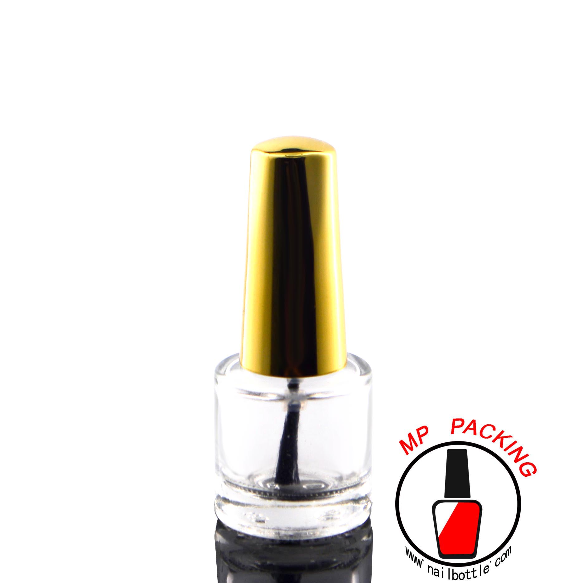 small short round empty bottle with lids and brush 