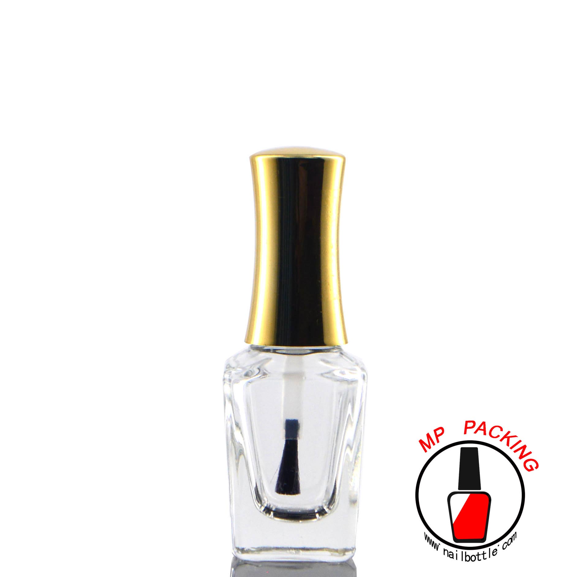 gold cap empty glass bottle with brush 