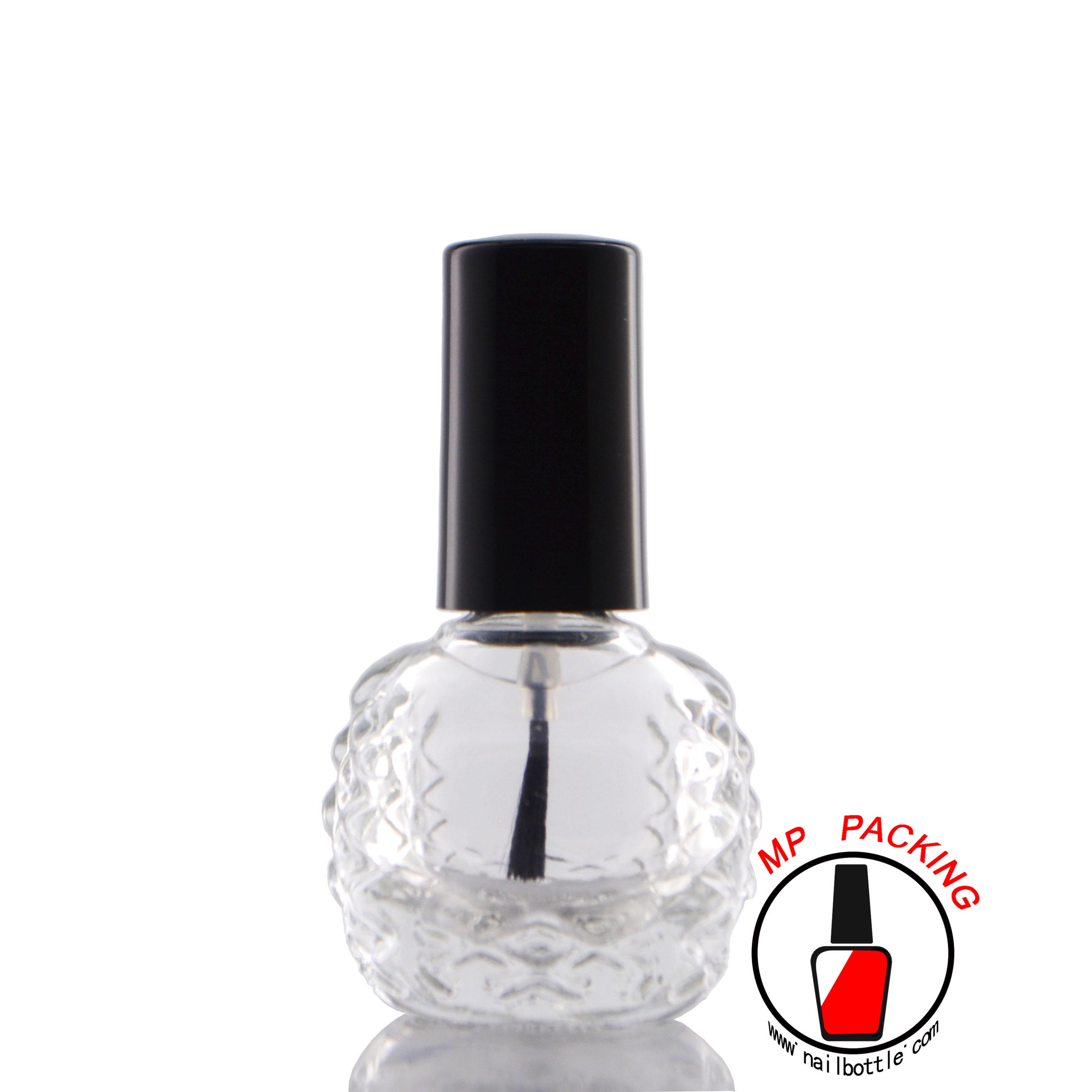 clear empty bottle with black caps and brush 