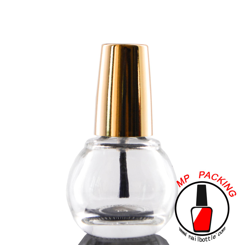 gold cap mini glass bottle and brush 