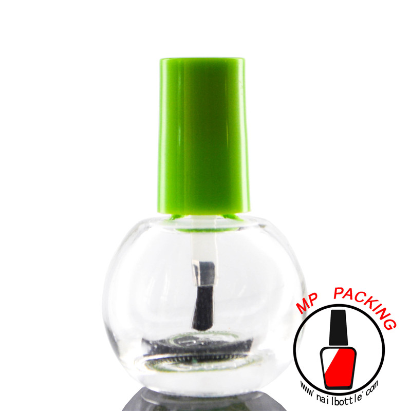 glass empty nail polish bottles and brush cap 
