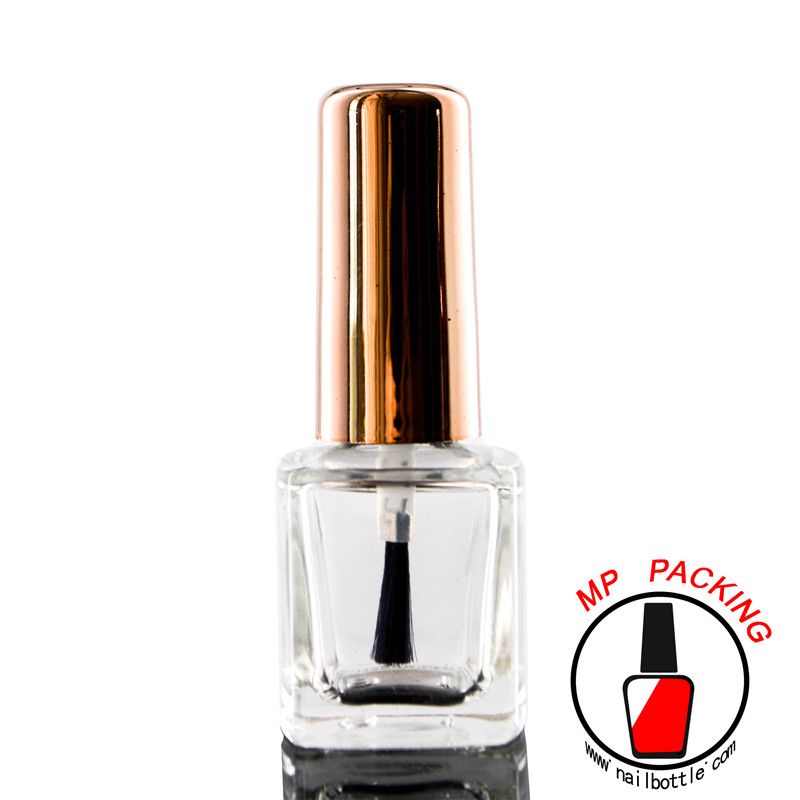 cosmetic packaging bottles empty nail varnish bottle rose golden cap and brush 