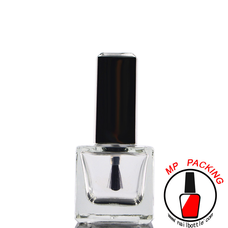 empty glass nail polish bottles with lids and brushes 